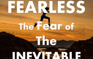 Text: Fearless: the Fear of the Inevitable, picture of woman jumping over a canyon